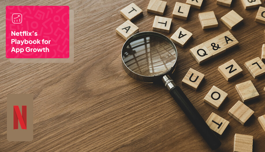 a magnifying glass with woodblocks of letters around it